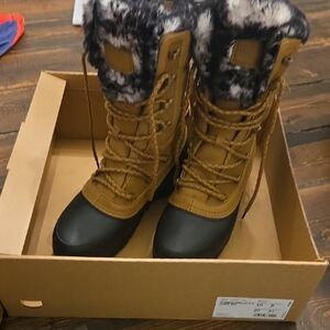 The North Face Tan and Black Winter Boots